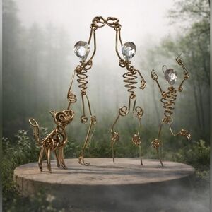 EUC Gold Toned Wire Skeletons (2 Pc)